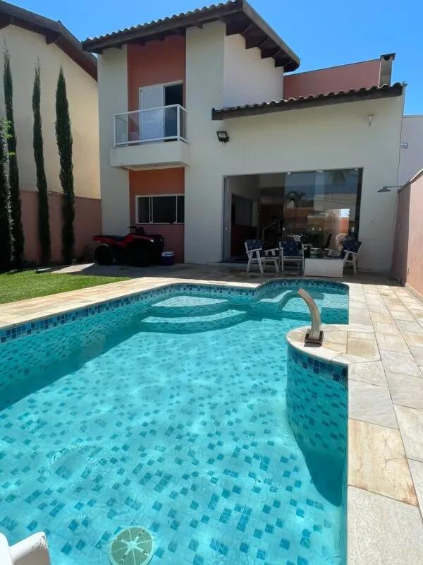 Linda casa condomínio fechado Ipês Joa com piscina – foto 1
